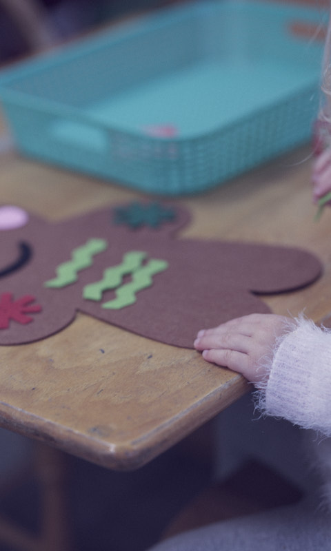 A child focuses on classroom work