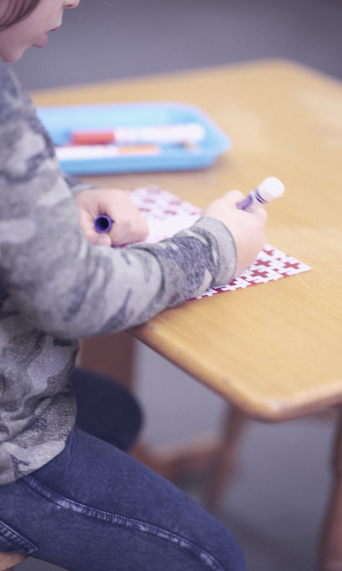 A child works on a lesson